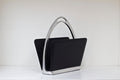 Stirrup Magazine Rack